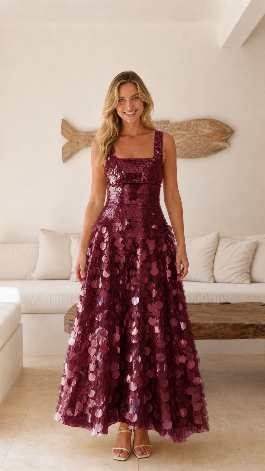Front view of model wearing a burgundy wine sequin square neck evening dress