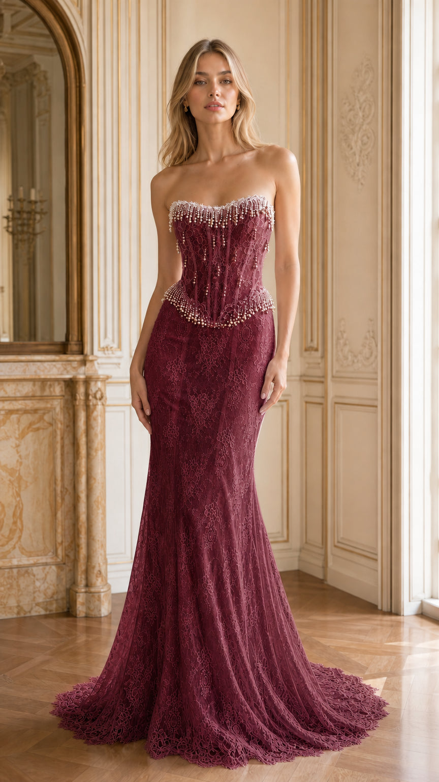 Front full-length view of burgundy strapless pearl beaded corset lace mermaid gown