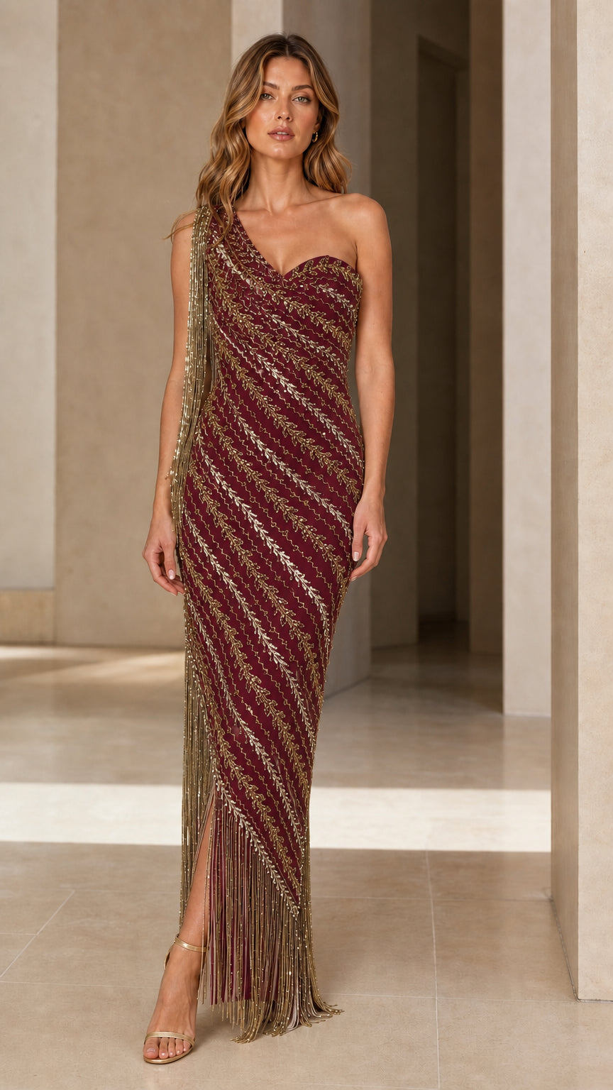 Burgundy wine one-shoulder beaded gala gown with cascading fringe trim