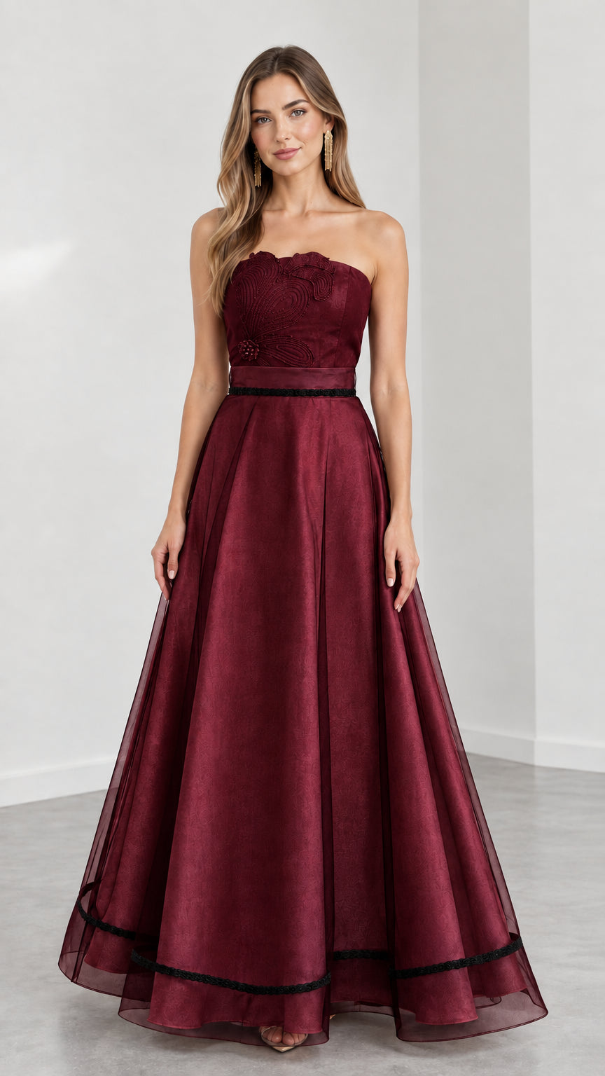 Model wearing Burgundy red strapless embroidered A-line evening dress