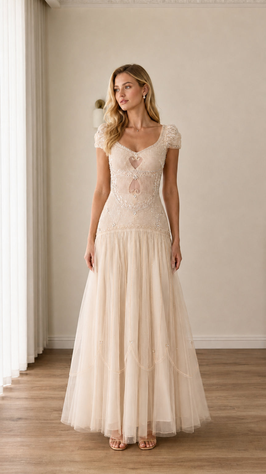Full-length view of champagne cream beaded cap-sleeve cutout tulle evening gown