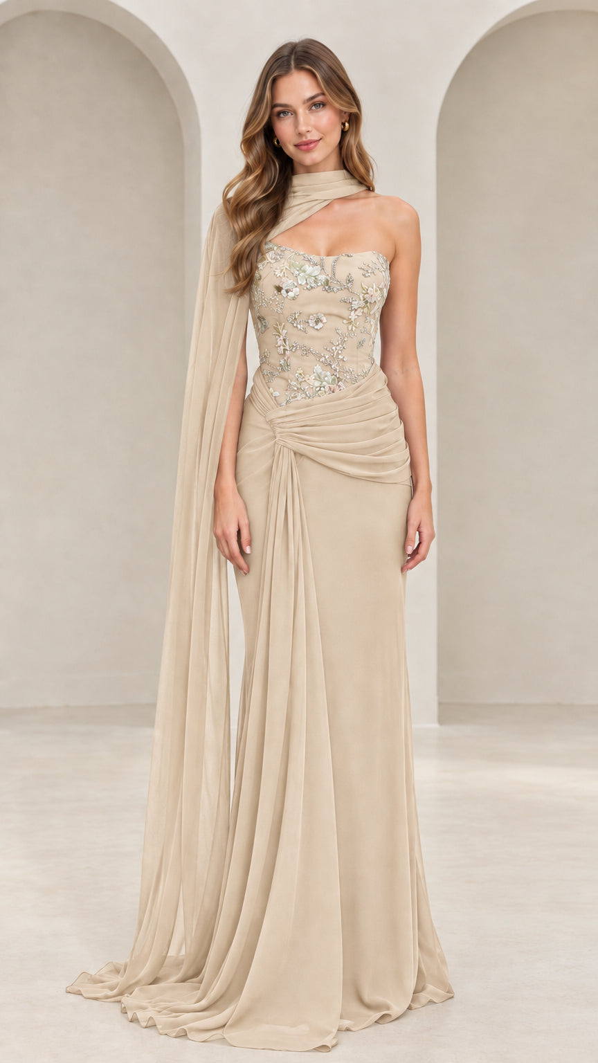 Front view of champagne beige floral embroidered cape evening gown