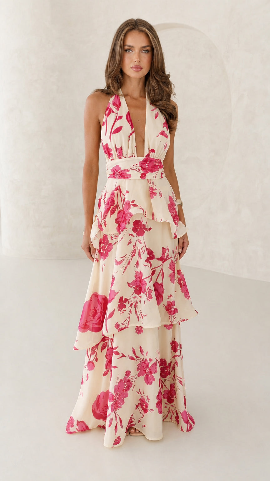 Front view of cream floral halter neck maxi dress