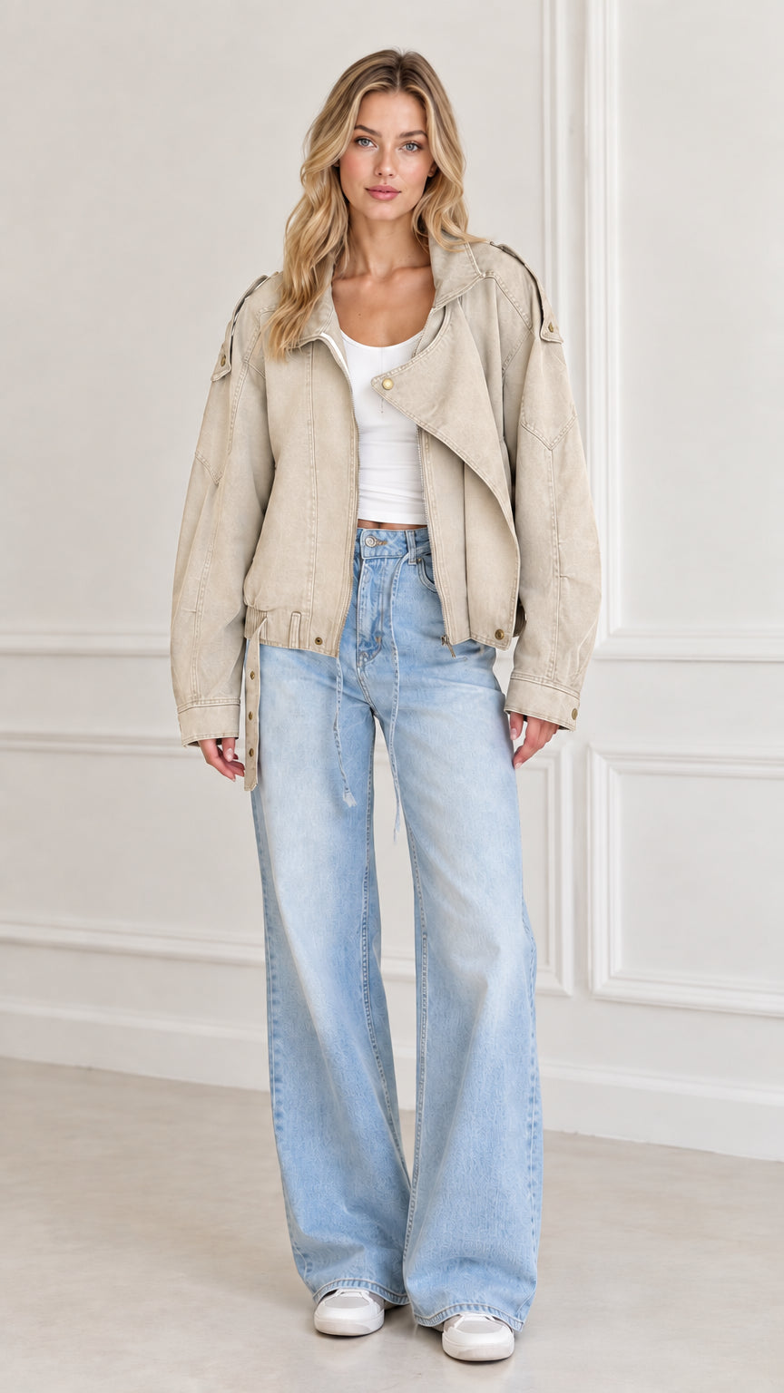 Model wearing Beige washed twill utility jacket styled with light blue jeans