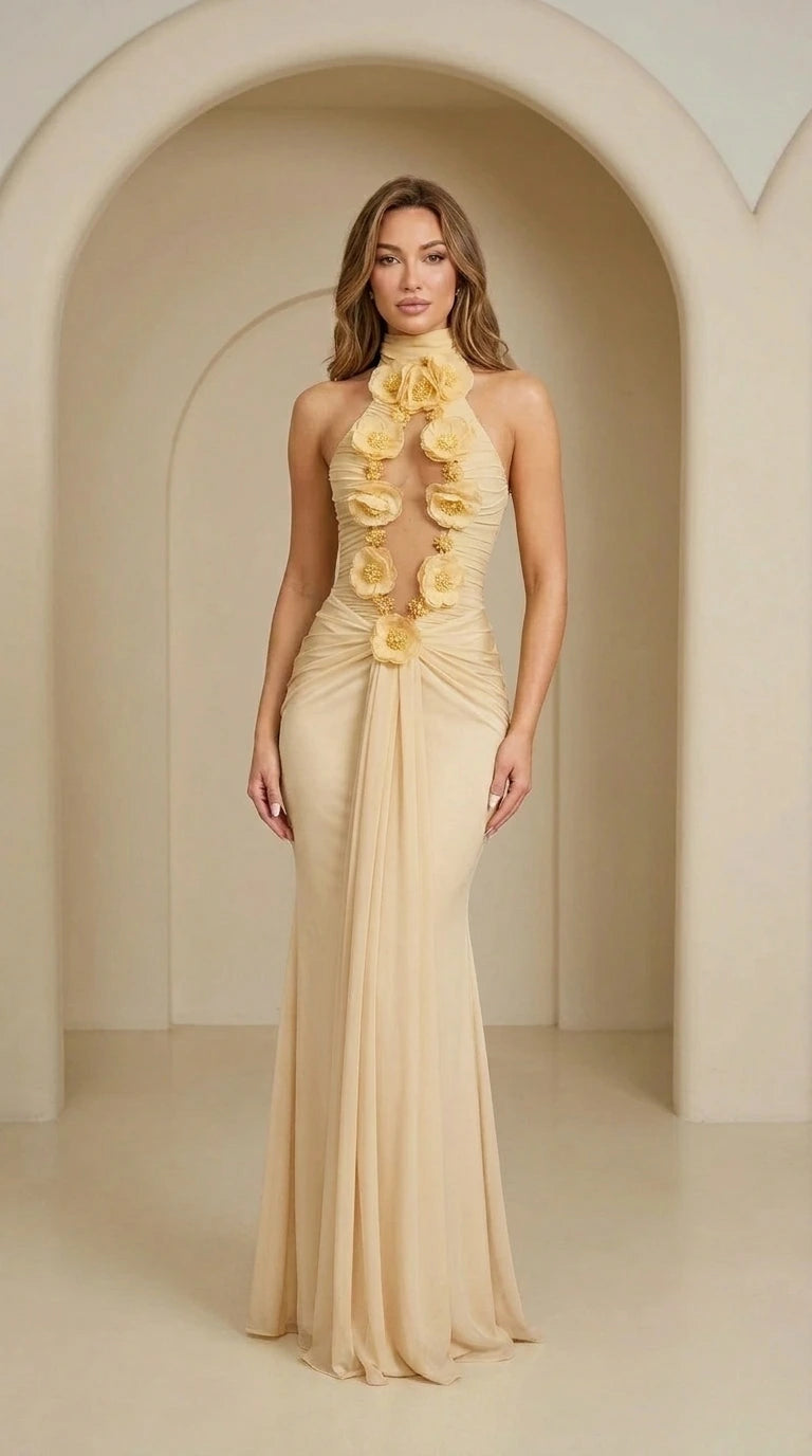 Front view of champagne halter neck rosette evening gown