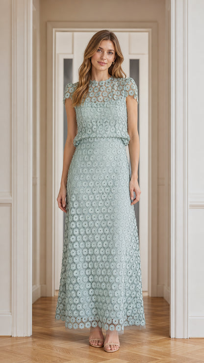 Model wearing sage green floral lace maxi dress, front view