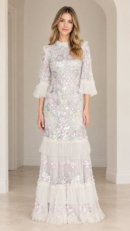 Front view of Ivory White floral sequin embroidered tiered maxi evening gown