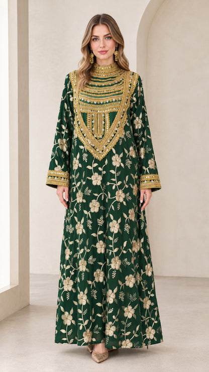 Front full view of woman wearing emerald green embroidered high neck maxi kaftan dress with gold bib detailing