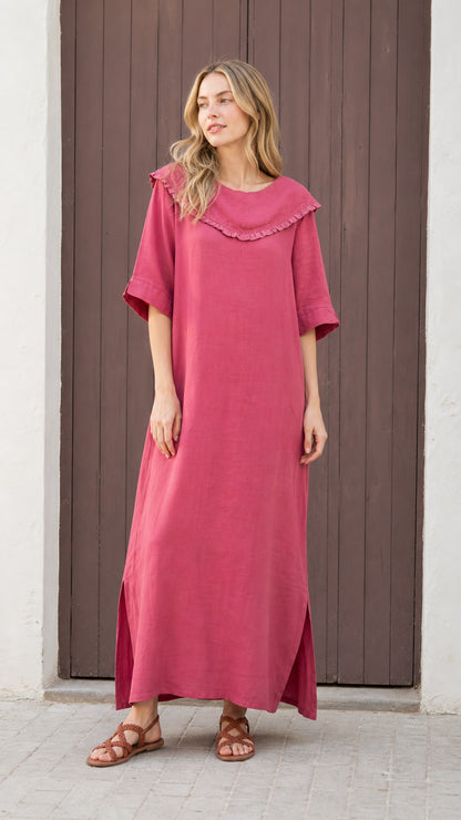 Front view of woman wearing rose pink ruffled sailor collar maxi dress