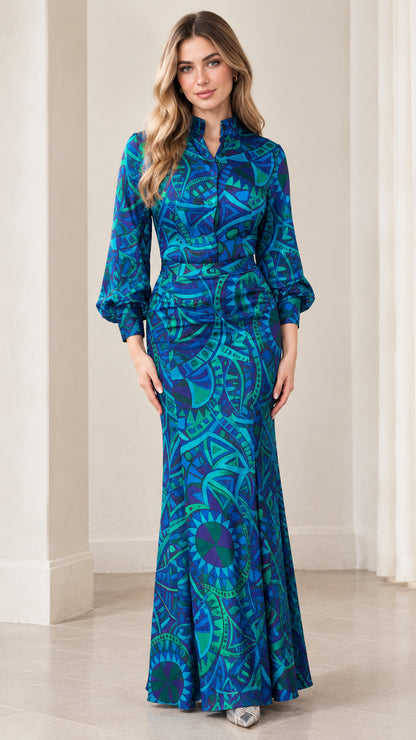 Front view of model wearing royal blue geometric print stand collar mermaid maxi dress