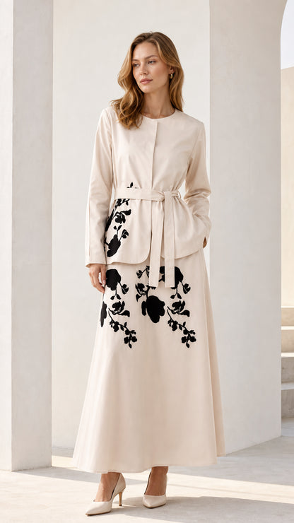 Front view of beige floral embroidered belted maxi dress