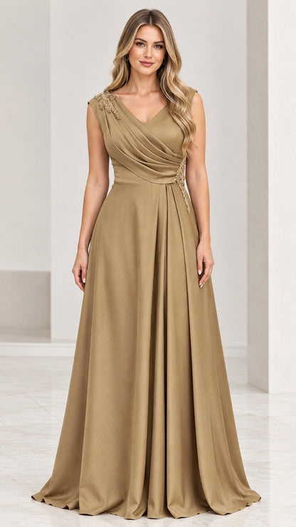 Full front view of elegant gold pleated V-neck floor-length evening gown