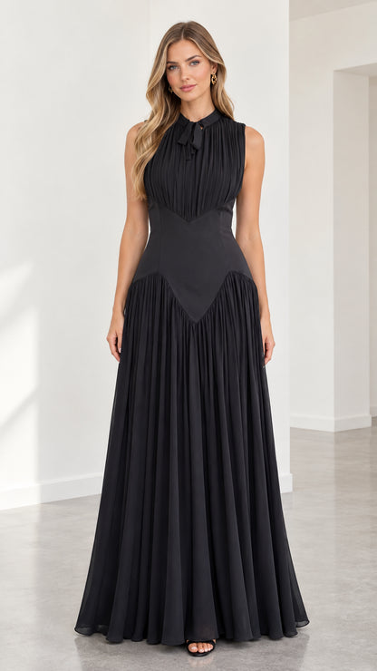 Front view of black sleeveless pleated maxi evening dress with tie neckline