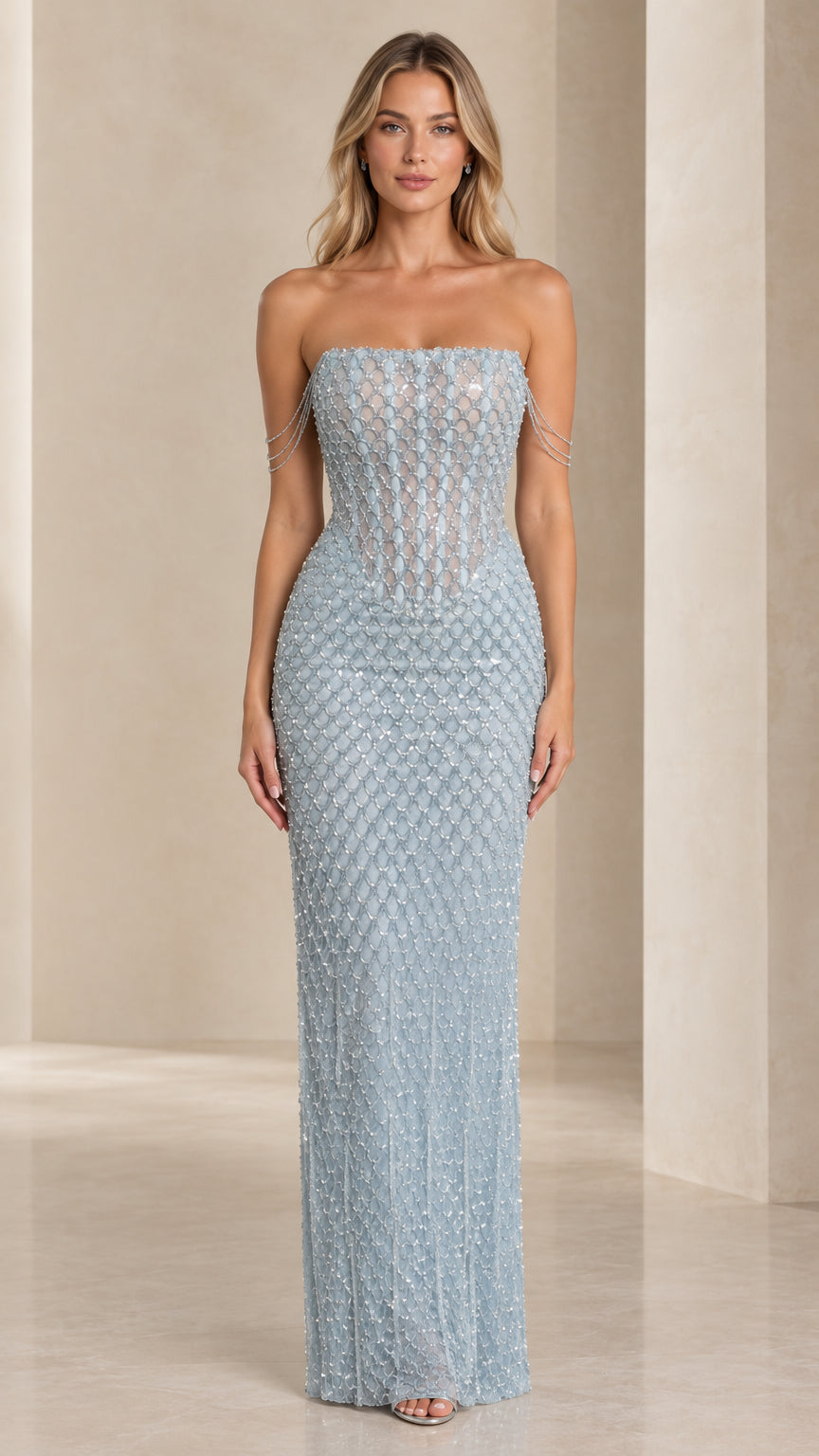 Front view of model wearing Ice Blue strapless beaded corset evening gown