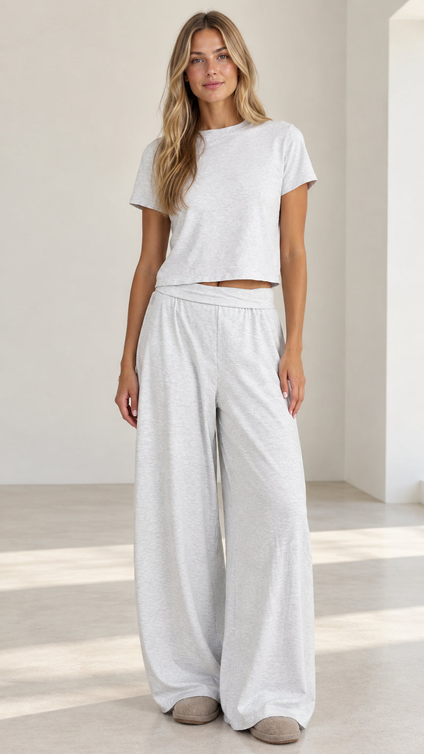 Full front view of model wearing light grey short sleeve crop tee and wide leg lounge pants set