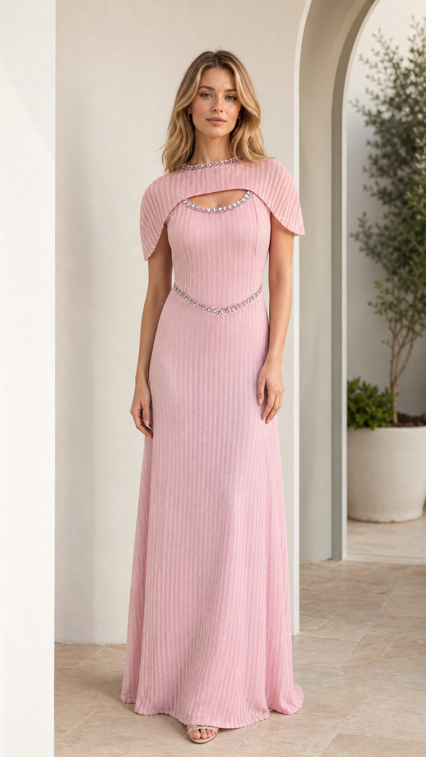 Pink pleated maxi evening dress with capelet sleeves and beaded trim front view