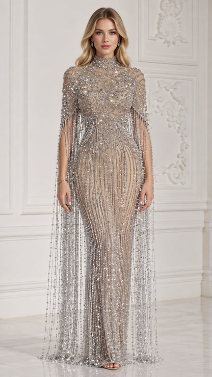Front view of Champagne Silver high neck beaded evening gown with long fringe cape sleeves on model