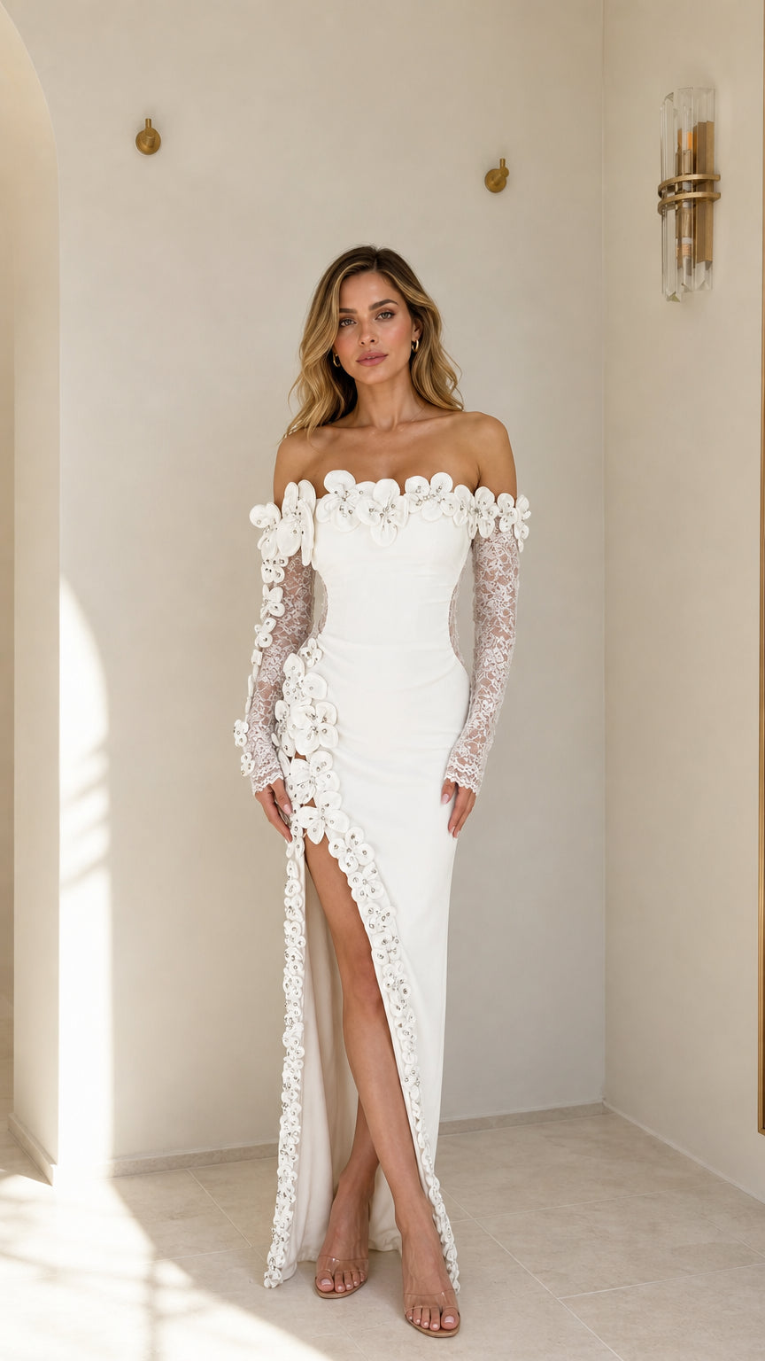 Front view of white off-shoulder 3D floral applique maxi dress