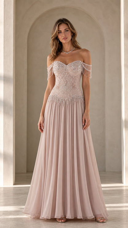 Front view of model wearing blush pink off-the-shoulder beaded chiffon evening gown