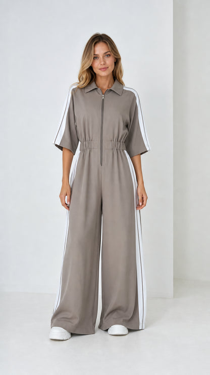 Taupe grey short sleeve wide leg jumpsuit with white side stripes front view