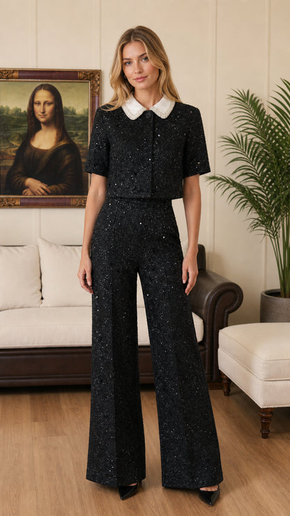 Front full-length view of black tweed two-piece cropped top and wide-leg pants set