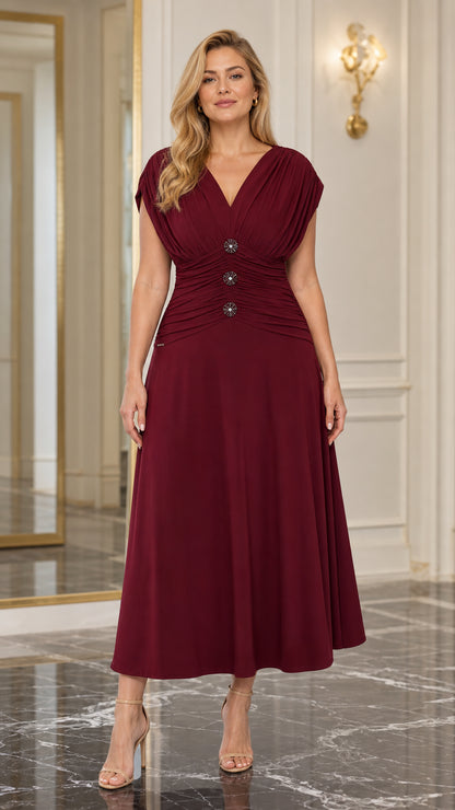Front view of woman wearing Burgundy Pleated V-Neck Ruched Midi Dress with crystal buttons