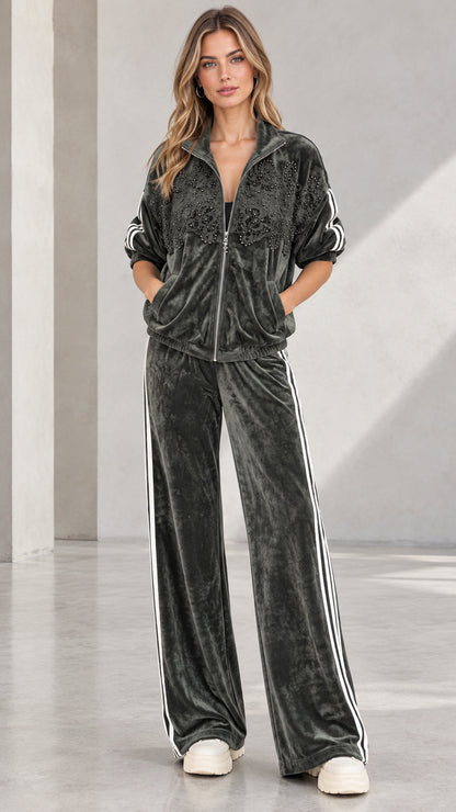 Front view of woman wearing Dark Green velvet 2-piece tracksuit with wide-leg pants