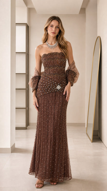 Front view of the brown embellished strapless evening gown