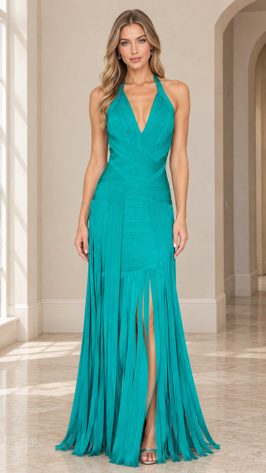 Front full view of woman wearing teal halter neck bandage fringe maxi dress with front slit