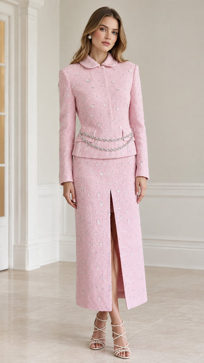 Front view of woman wearing pink embellished tweed blazer and slit maxi skirt set