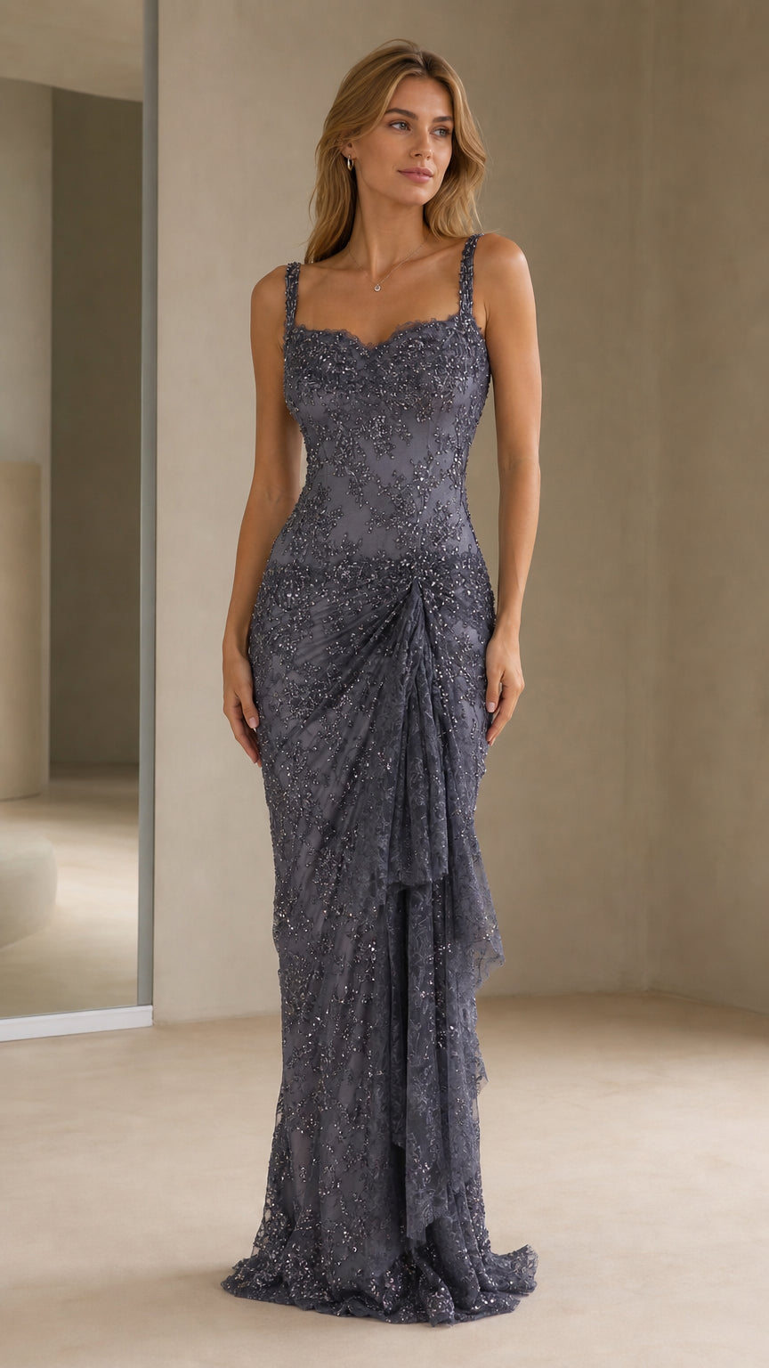 Front view of model wearing slate blue beaded evening gown