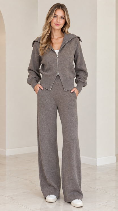 Front view of woman wearing charcoal grey 2-piece knit zip-up jacket and wide-leg loungewear set