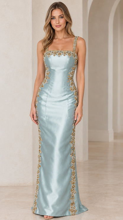 Front view of woman wearing Light Blue square neck satin maxi dress with gold beaded trim