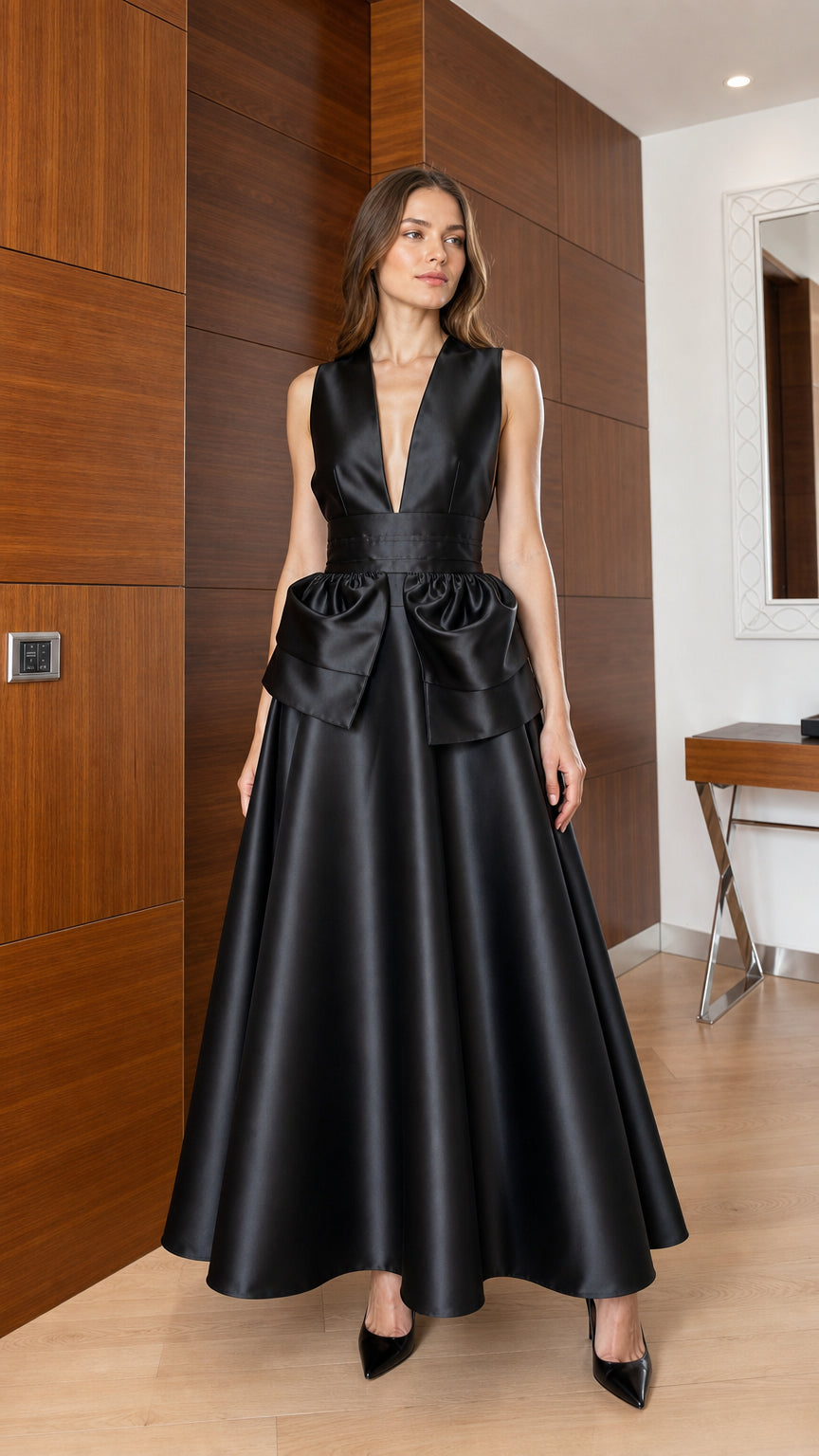 Front view of black sleeveless V-neck satin maxi dress with waist bow
