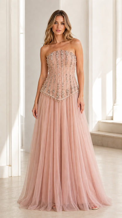 Front view of pink embellished strapless tulle evening gown