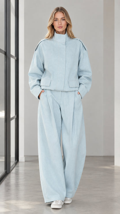 Front full view of woman wearing Light Blue cropped stand collar jacket and wide leg pants set