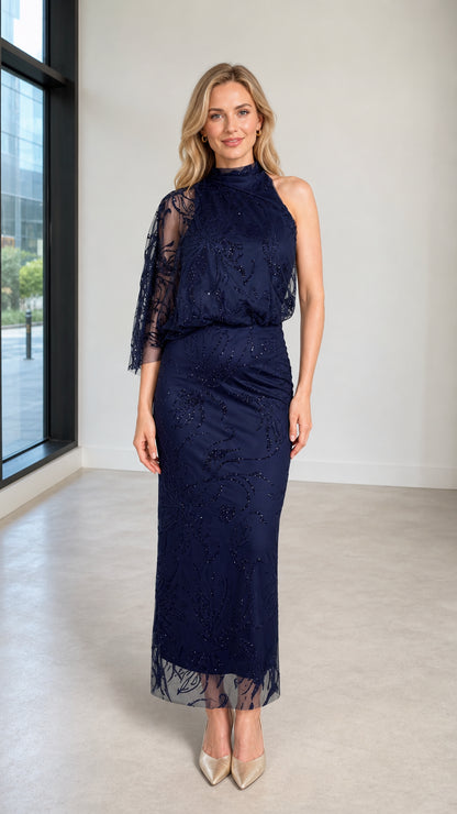 Front view of Navy sequin embroidered capelet maxi dress