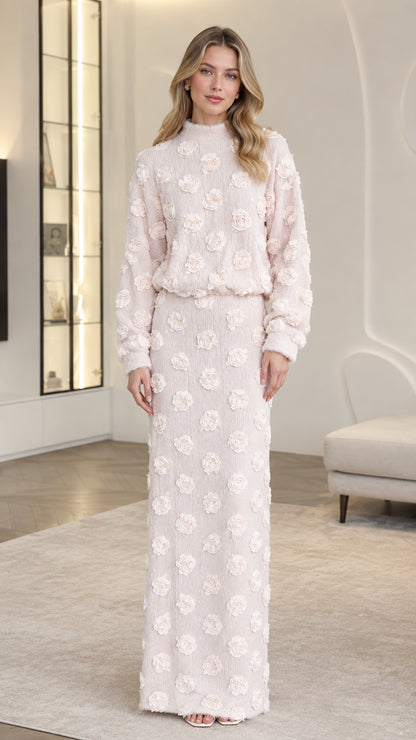 Front full-length view of woman wearing Blush Pink 3D floral appliqué long sleeve top and maxi skirt set