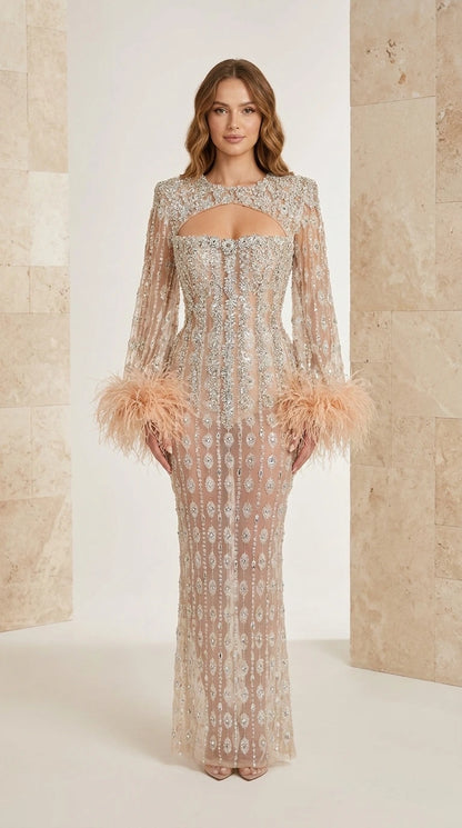 Champagne long sleeve beaded evening maxi gown with feather cuffs and cutout front view