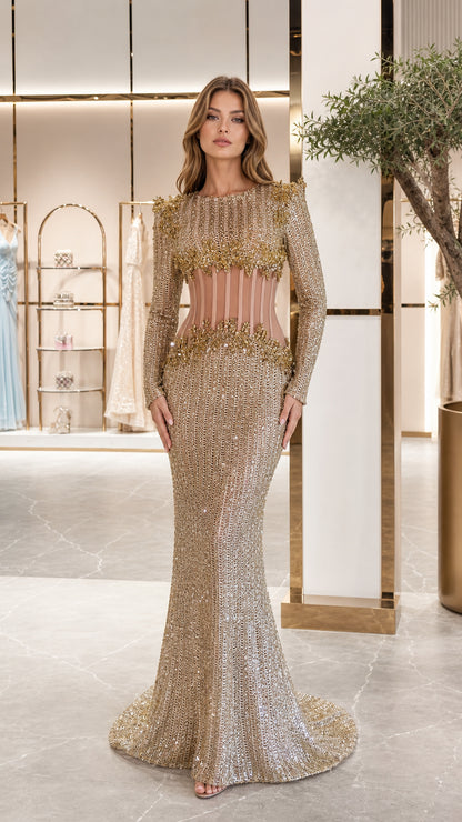 Model wearing champagne gold long sleeve sequin gown with illusion corset waist front view