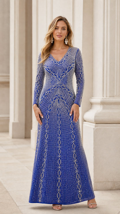 Front view of royal blue long sleeve beaded formal evening gown