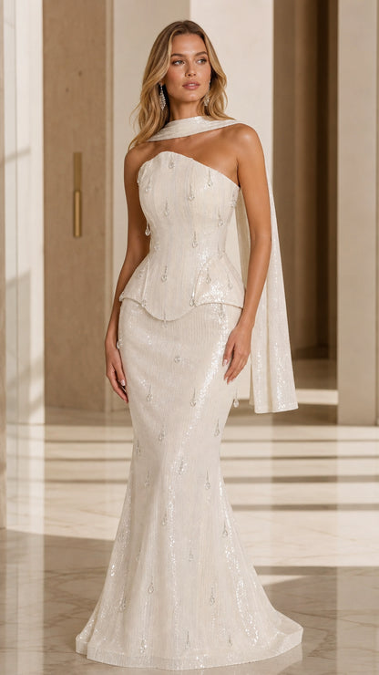 Ivory strapless sequin mermaid gown with peplum waist and matching scarf front view