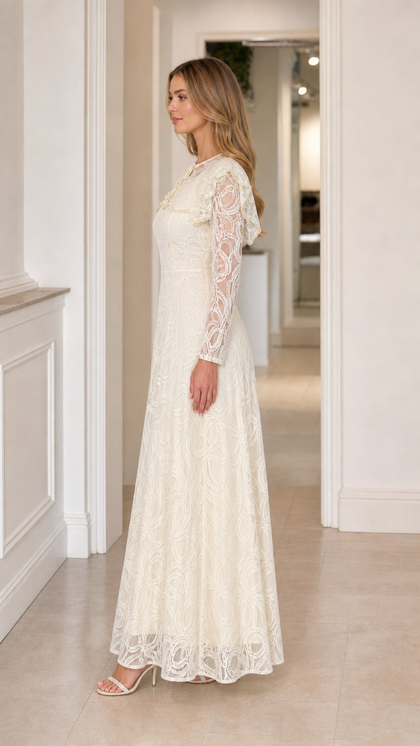 Side profile view of the Ivory Lace Capelet Maxi Dress