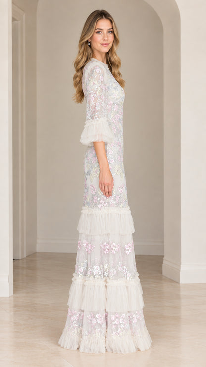 Side profile view of Ivory White tiered sequin embroidered evening dress