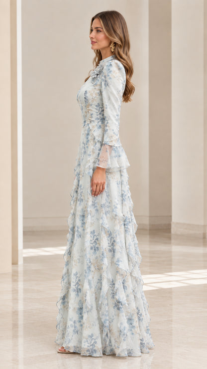 Side profile view of dusty blue floral long sleeve ruffle evening gown