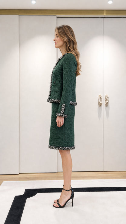 Model wearing green tweed set, side profile