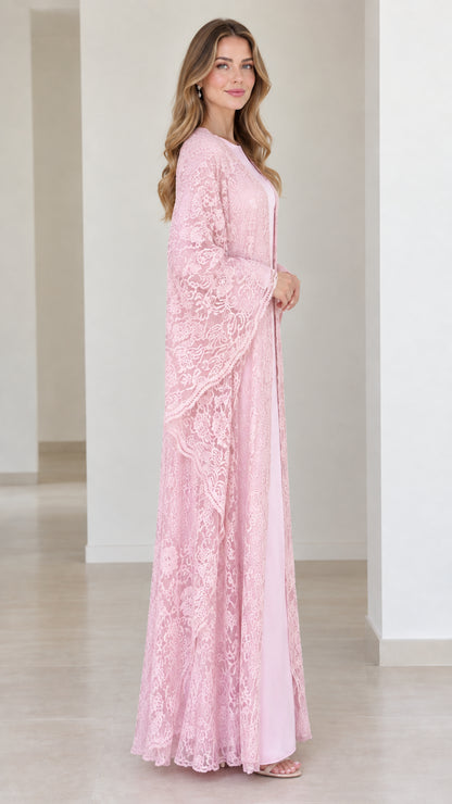 Side profile of model in light pink lace open-front duster over full-length inner dress