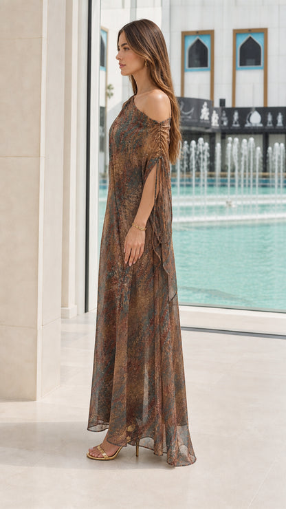 Side view of Bronze Multi one-shoulder printed kaftan dress showing drape and length