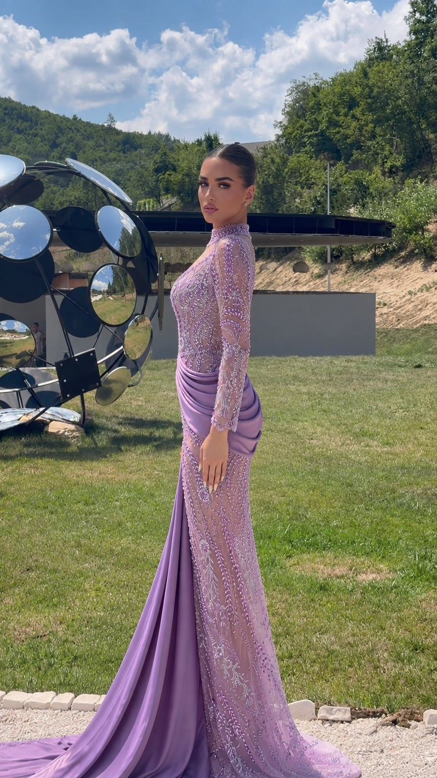 Side view of lilac embellished mermaid gown showing fitted silhouette and side drape