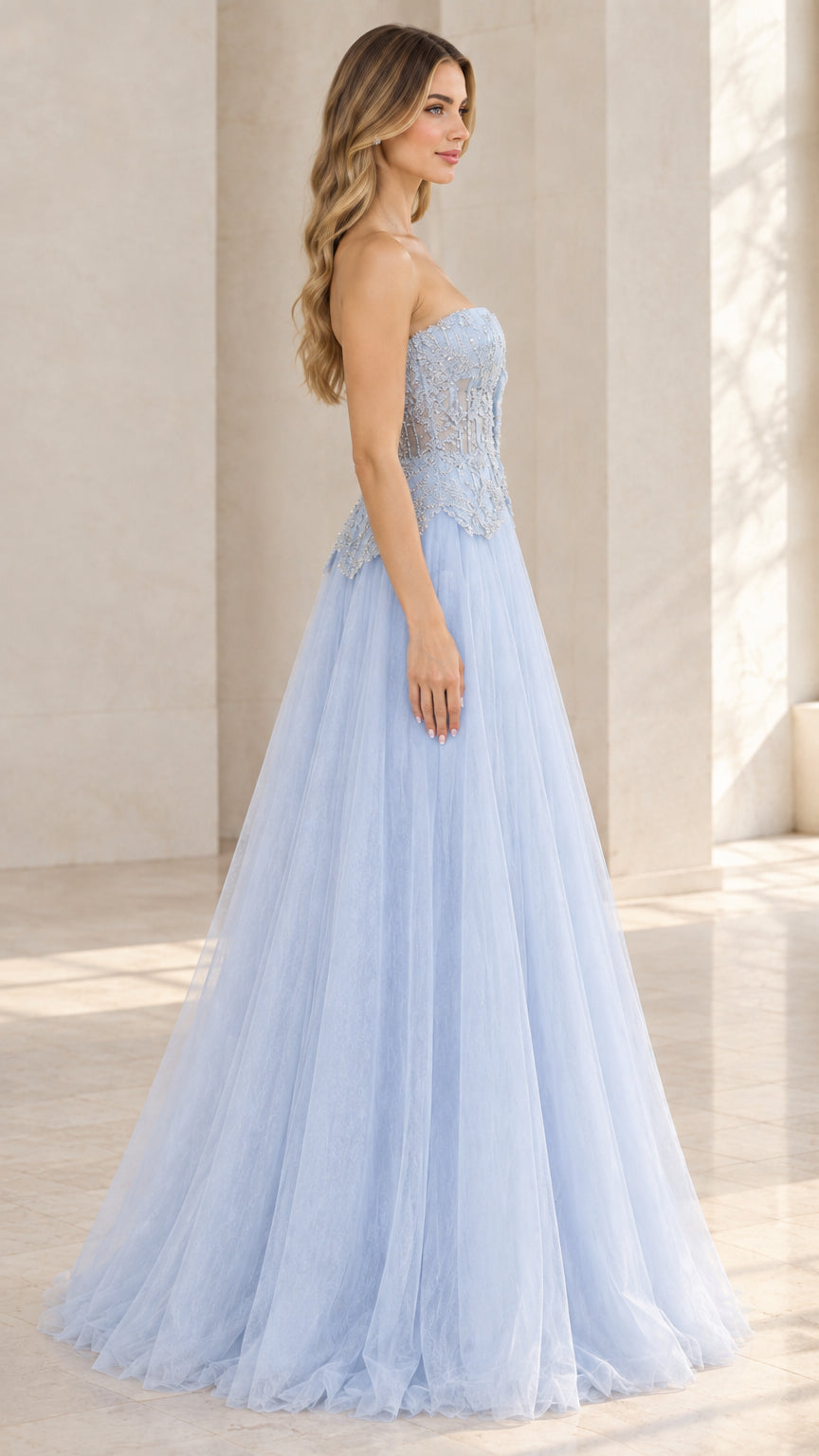 Side profile view of light blue strapless beaded formal gown